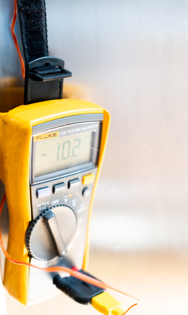 Fluke Digital Meter reading 10.2 degrees on home refrigerator